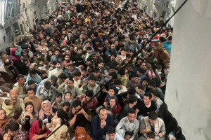 Inside Reach 871, A US C-17 Packed With 640 Afghans Trying to Escape the Taliban