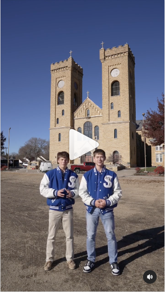 Fr. Jarett Konrade record-breaking baksetball shot- St. John the baptist Catholic school 